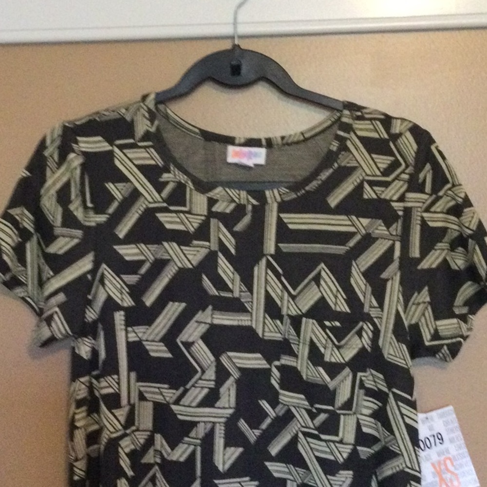 New with tags Lularoe Carly Dress, size XS. Gray with geometric pattern